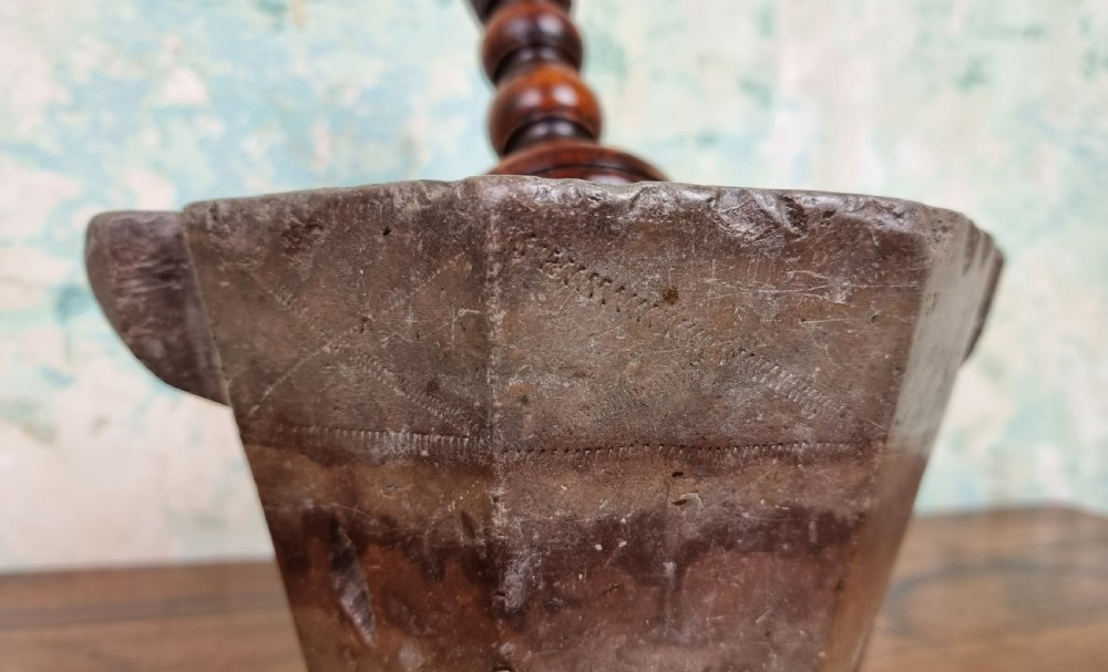 A 17th century marble mortar and pestle. View IV