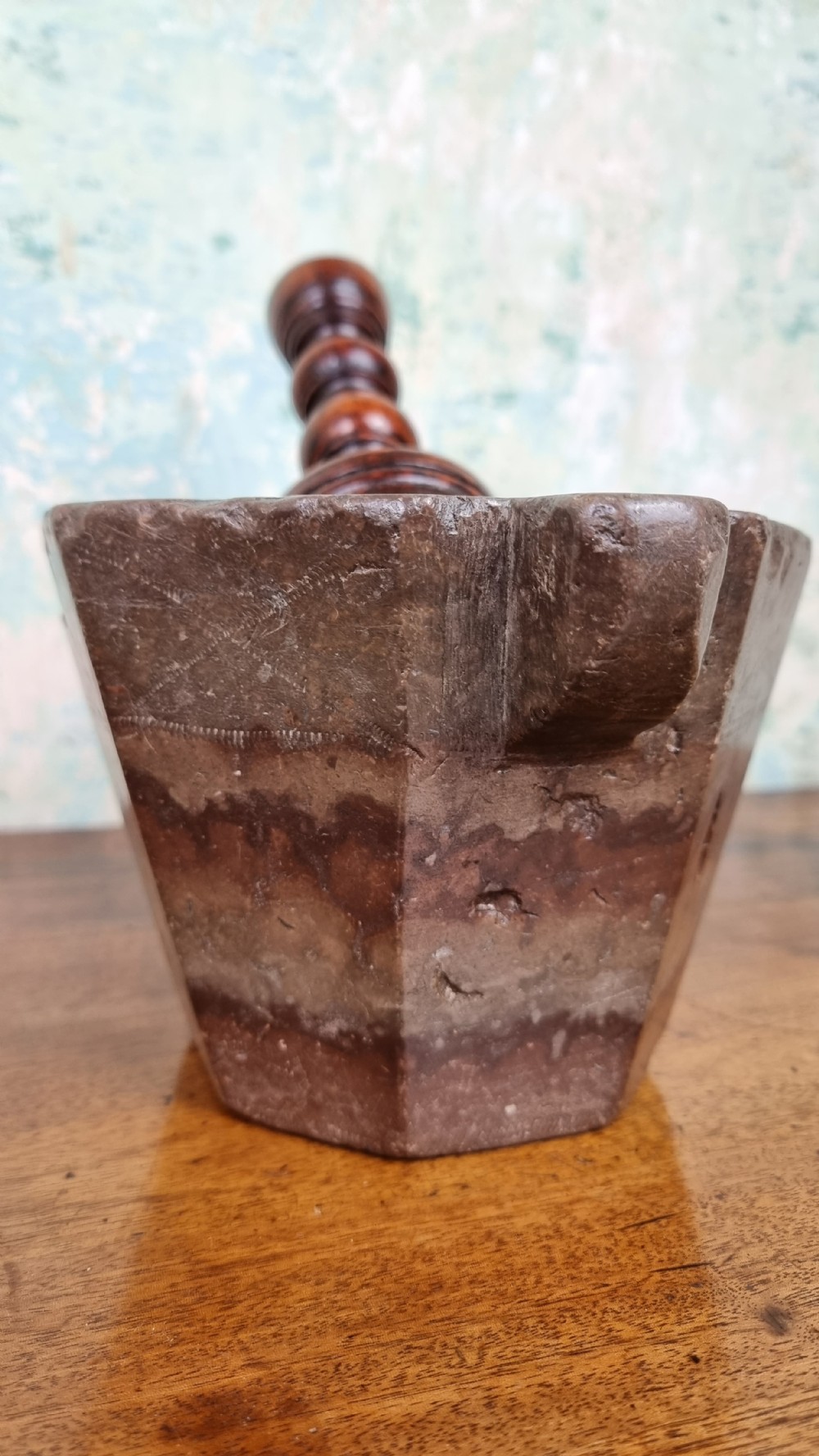 A 17th century marble mortar and pestle. View X