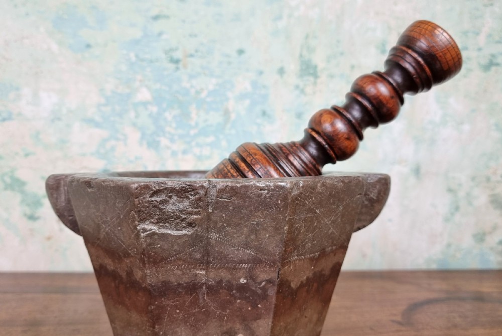 A 17th century marble mortar and pestle. View XII