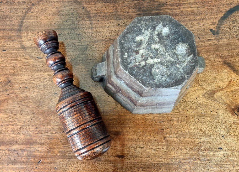 A 17th century marble mortar and pestle. View XIII