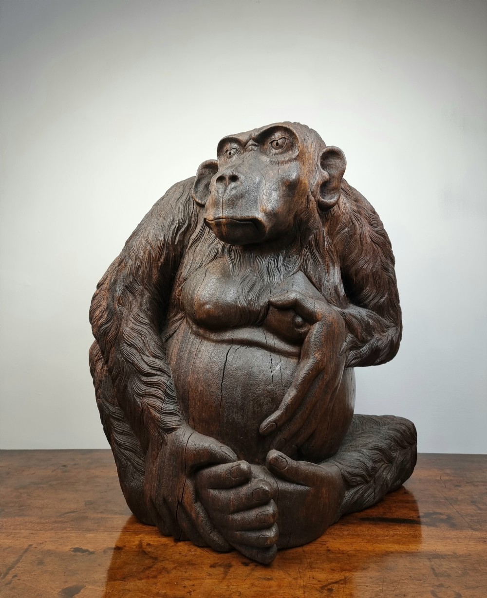 A large late 19th century carved monkey. 