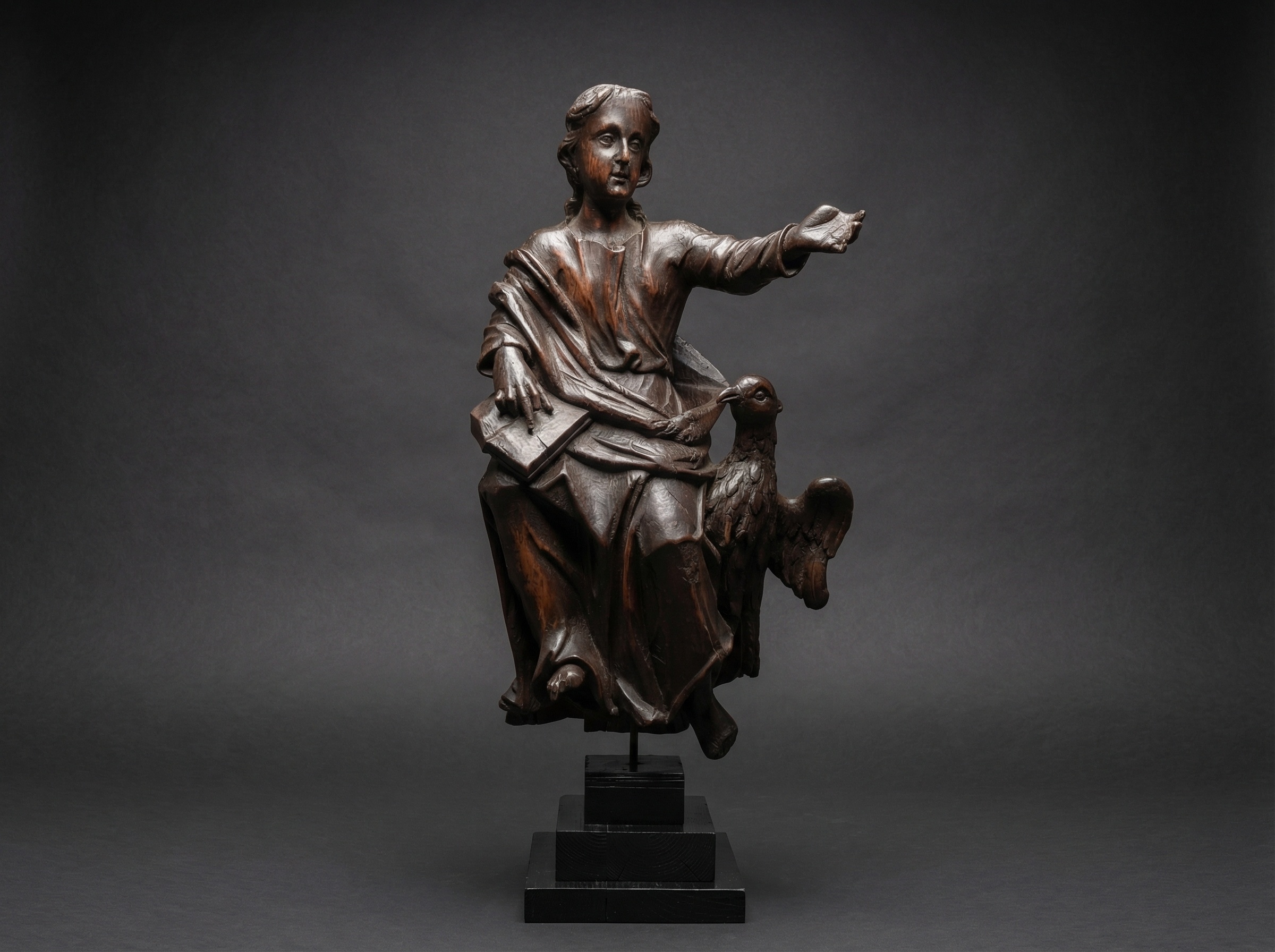 Early Ecclesiastical Carved Wood Statue of Saint John with Eagle. Circa 1750.